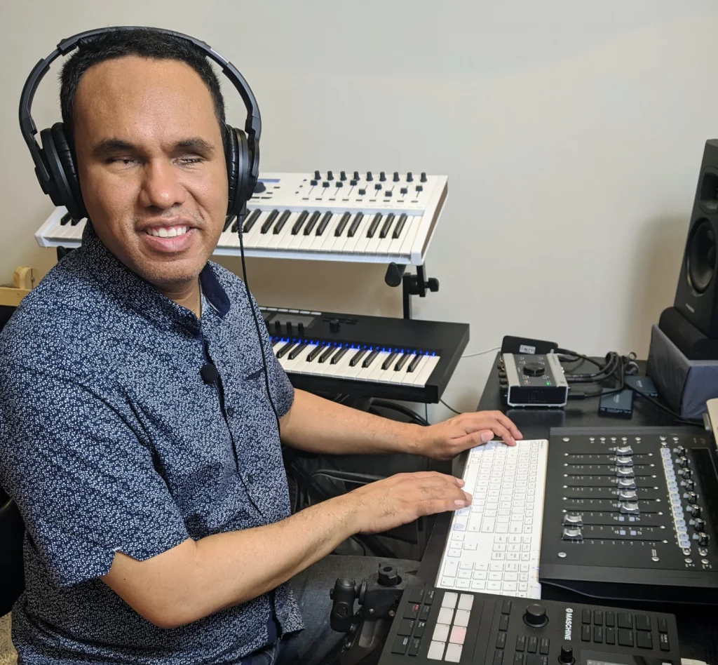 Jason Dasent sitting in front of his workstation