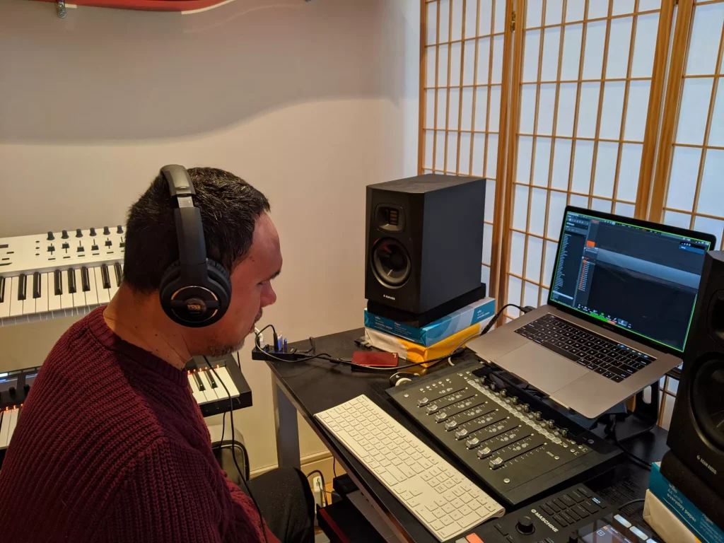 Jason Dasent sitting in front of his workstation