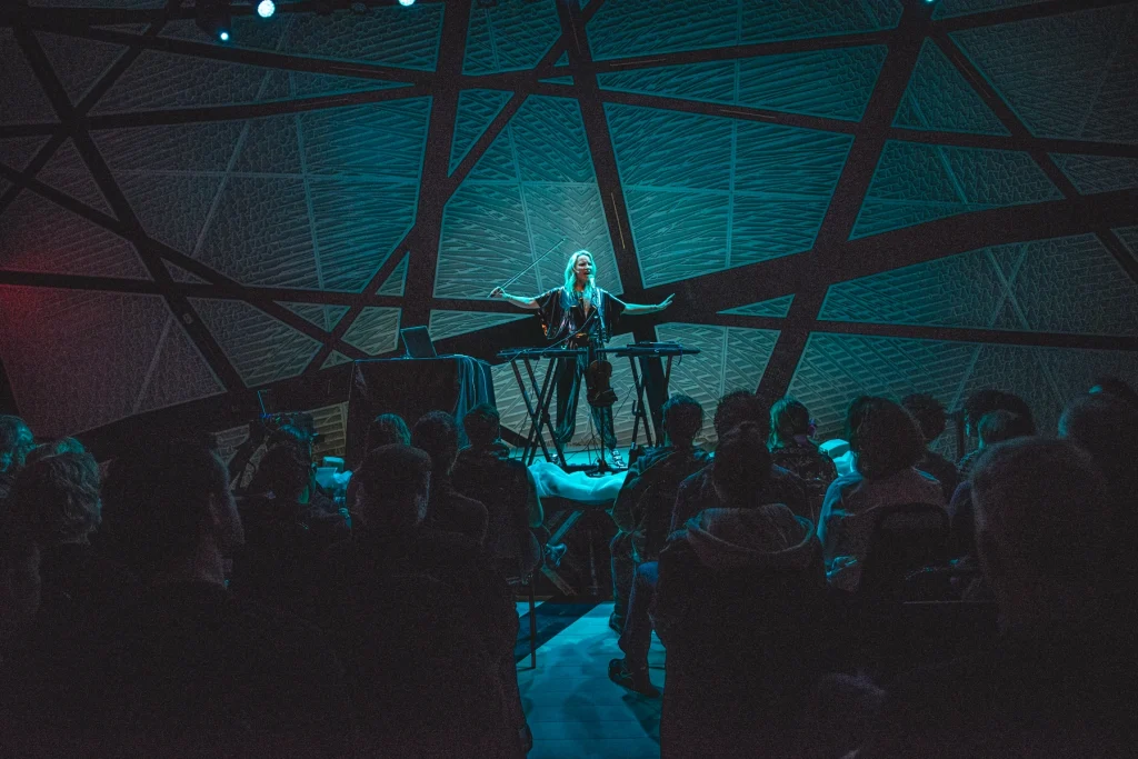 Laura Escudé performing on stage