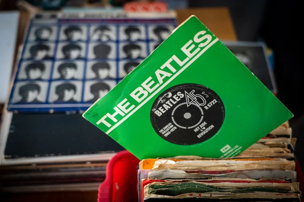 A bright green The Beatles vinyl record