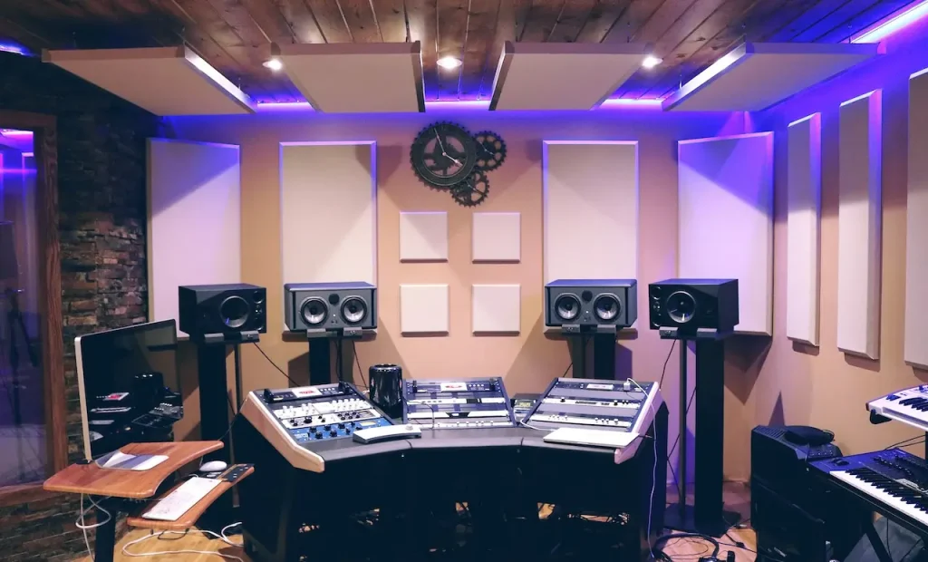 Speakers and a mixing console in a recording studio