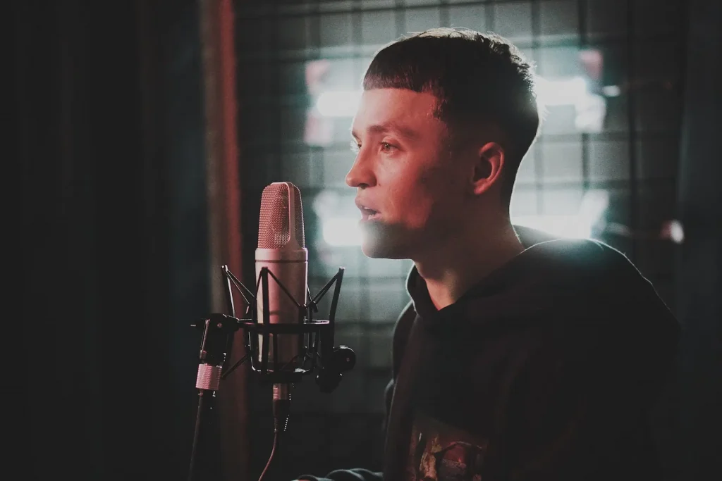 A man singing into a microphone