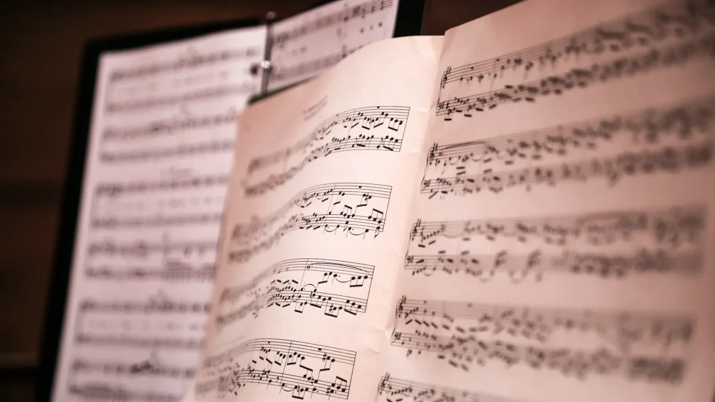 Sheet music open on a music stand