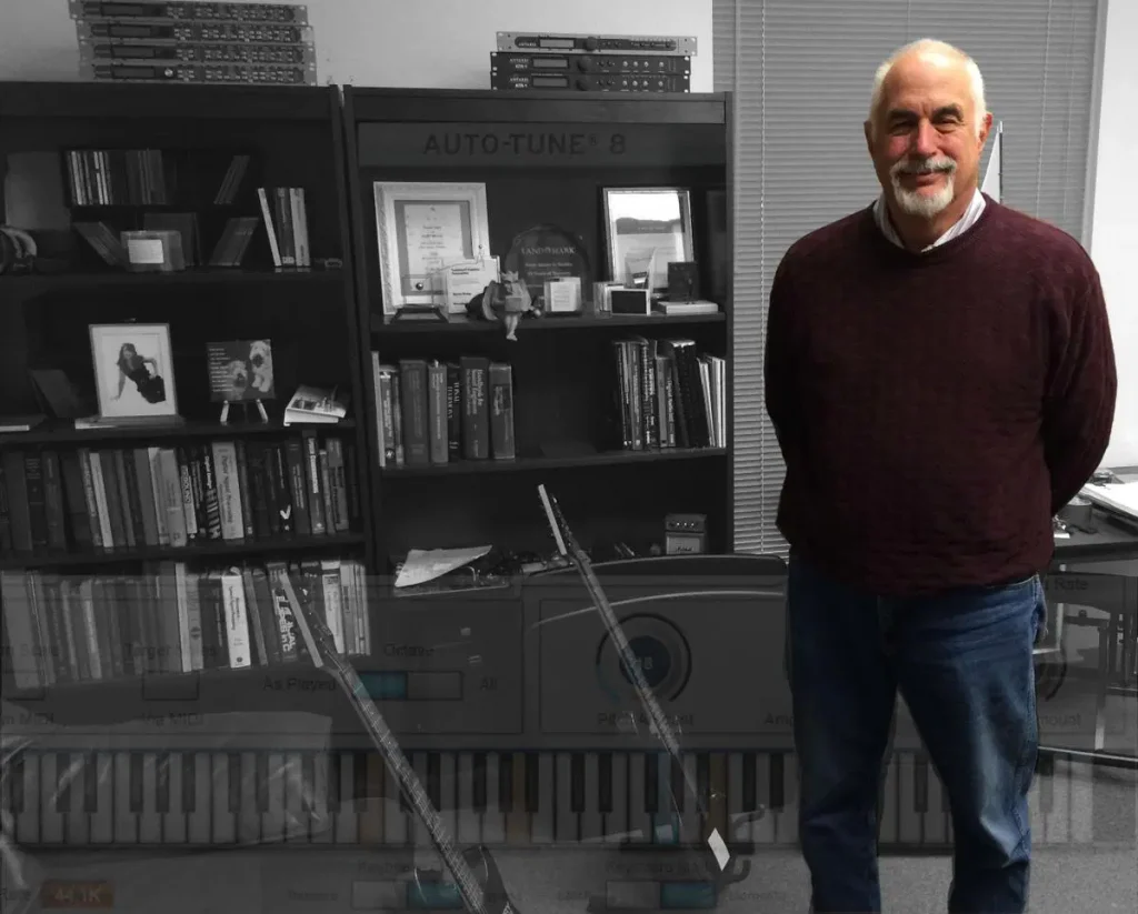 A photo of Dr. Andy Hildebrand standing in his office