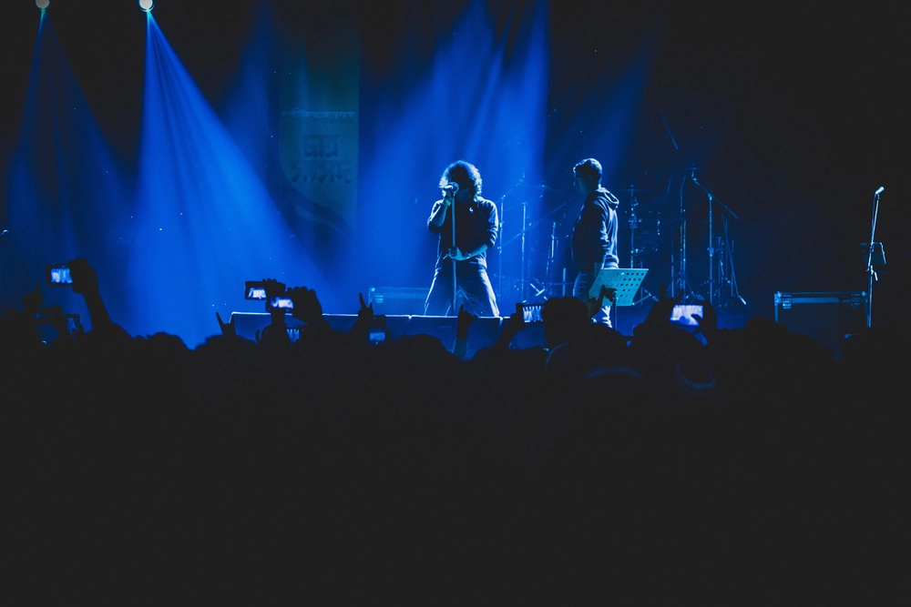 Two men performing on stage
