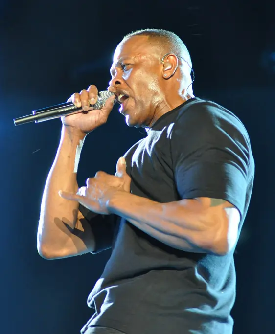 Image of Dr. Dre rapping into a microphone