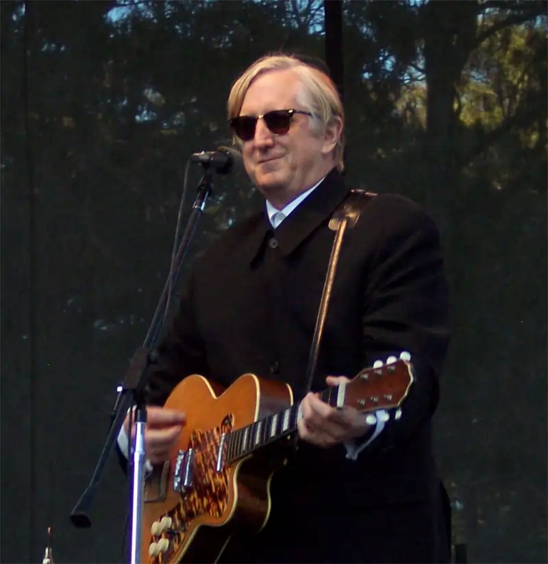 Joseph Henry "T Bone" Burnett III playing the guitar