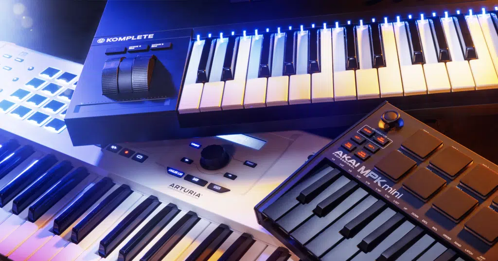 A pile of MIDI keyboards