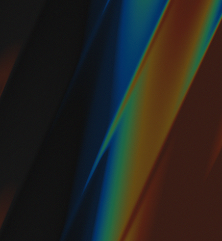 Black background with blue, orange, and green light waves