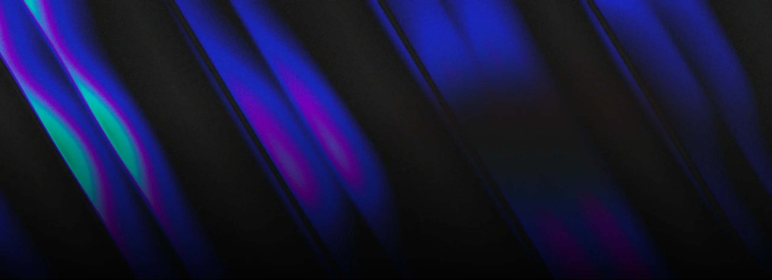 Black background with purple and blue light waves