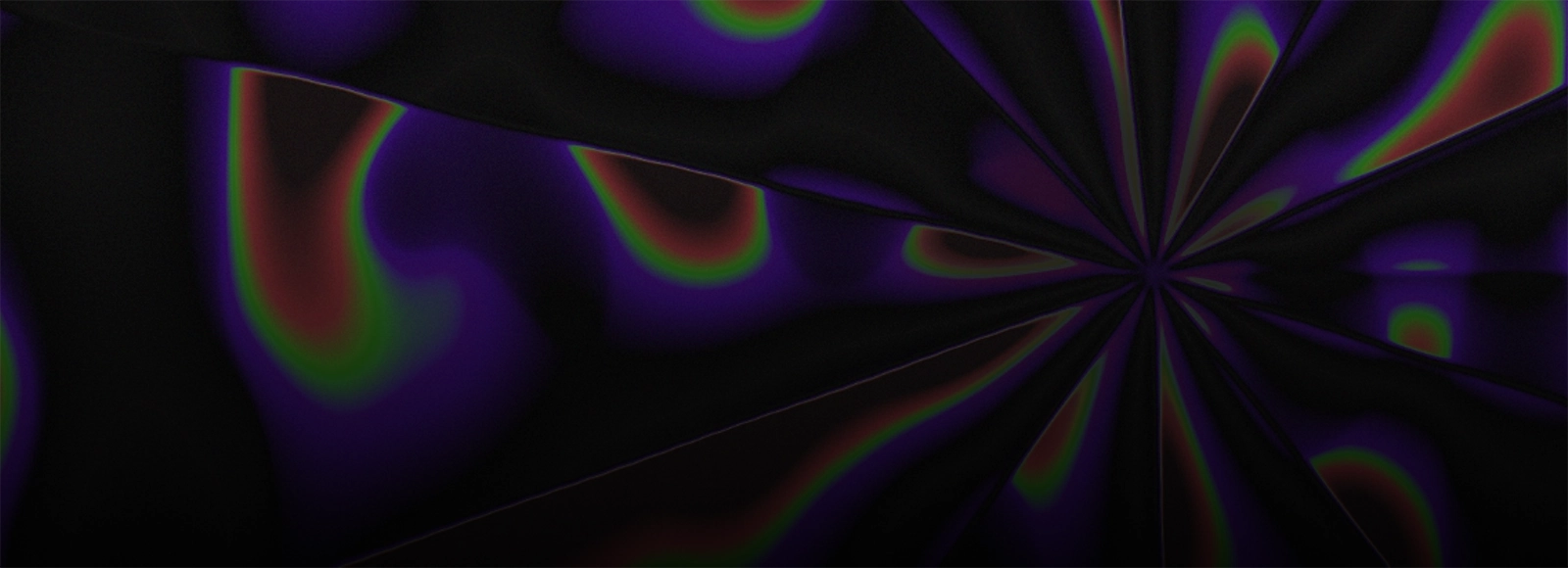 Black background with purple, green, and orange light blobs