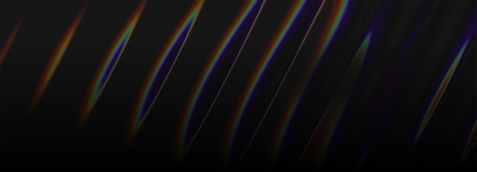 Black background with blue, orange, and green diagonal light waves